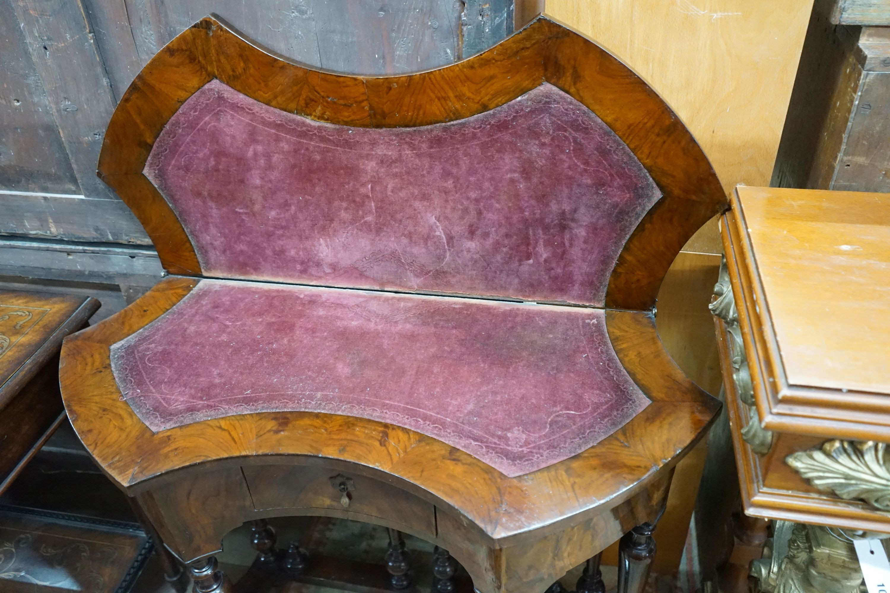 A Queen Anne Revival walnut folding card table, width 84cm, depth 37cm, height 74cm